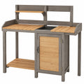 Gartenarbeitstisch 120 x 55 x 160 cm aus Holz grau/natur mit Stauraum und Pflanzwanne